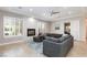 Relax in this modern living room with a cozy fireplace and stylish decor at 3662 Riley Ann Ave, Las Vegas, NV 89139