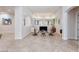 Inviting living room featuring neutral tones, tile floors, and recessed lighting at 3662 Riley Ann Ave, Las Vegas, NV 89139