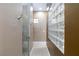 Walk-in shower with glass block accents at 3662 Riley Ann Ave, Las Vegas, NV 89139