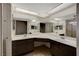 Bright bathroom featuring a long countertop with dual sinks, ample cabinet space, and recessed lighting at 3667 Edinburgh Dr, Las Vegas, NV 89103