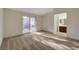 Light-filled bedroom with sliding glass doors and convenient access to an ensuite bathroom, blending comfort and functionality at 3667 Edinburgh Dr, Las Vegas, NV 89103