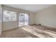 Bedroom featuring large windows, plush carpeting and neutral walls at 3667 Edinburgh Dr, Las Vegas, NV 89103