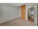 This bedroom is carpeted and includes a closet and a window for natural light at 3667 Edinburgh Dr, Las Vegas, NV 89103