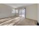 Spacious bedroom featuring a sliding glass door and plush carpeting at 3667 Edinburgh Dr, Las Vegas, NV 89103