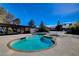 Open community pool with hot tub and pergola perfect for community members to enjoy at 3667 Edinburgh Dr, Las Vegas, NV 89103