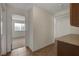 Hallway featuring tile flooring leads to the living area and bedroom at 3667 Edinburgh Dr, Las Vegas, NV 89103