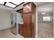 Kitchen with stainless steel refrigerator and a view to the Gathering room at 3667 Edinburgh Dr, Las Vegas, NV 89103