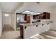 Bright kitchen with stainless steel appliances, peninsula and ample counter space at 3667 Edinburgh Dr, Las Vegas, NV 89103
