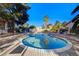 Inviting community pool surrounded by lush landscaping, with plenty of seating, and a tranquil atmosphere at 3667 Edinburgh Dr, Las Vegas, NV 89103