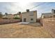 Spacious backyard with block wall fence, patio and potential for landscaping at 3914 Steinbeck Dr, Las Vegas, NV 89115
