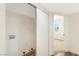 Bright laundry area with modern hookups and wood look flooring for easy cleaning at 3914 Steinbeck Dr, Las Vegas, NV 89115