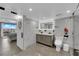 Bright bathroom features a modern vanity, sleek shower, and city views at 3930 University Center Dr # 909, Las Vegas, NV 89119