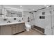 Stylish bathroom featuring double sinks, sleek fixtures, and a walk-in shower at 3930 University Center Dr # 909, Las Vegas, NV 89119