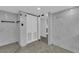 Bathroom features marble floors and walls, a shower, and mirrored doors at 3930 University Center Dr # 909, Las Vegas, NV 89119