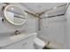 Updated bathroom featuring modern fixtures and a glass-enclosed shower at 3930 University Center Dr # 909, Las Vegas, NV 89119