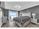 Bright bedroom features large windows and great views of the city skyline at 3930 University Center Dr # 909, Las Vegas, NV 89119
