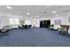 Spacious common area featuring a seating area, workspaces, and sleek, modern furniture at 3930 University Center Dr # 909, Las Vegas, NV 89119