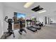 Well-equipped gym with treadmills, ellipticals, and weight machines and lots of natural light at 3930 University Center Dr # 909, Las Vegas, NV 89119