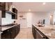 Well-lit kitchen with granite countertops, stainless steel appliances, and ample cabinet space at 4227 Diya Ave, North Las Vegas, NV 89084