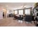 Spacious living area featuring tile flooring, modern furnishings, and a ceiling fan at 4227 Diya Ave, North Las Vegas, NV 89084