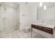 Modern bathroom showcases a glass shower, floating vanity, and sleek marble floors at 4471 Dean Martin Dr # 1207, Las Vegas, NV 89103
