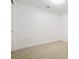Bright, empty bedroom offers natural light, white walls, and light wood flooring at 4471 Dean Martin Dr # 1207, Las Vegas, NV 89103
