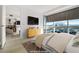 Bedroom features floor to ceiling windows with natural light and an adjoined kitchen at 4471 Dean Martin Dr # 1207, Las Vegas, NV 89103