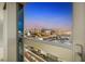 Enjoy stunning city views from the condo's balcony showcasing vibrant Las Vegas skyline and bustling city streets below at 4471 Dean Martin Dr # 1207, Las Vegas, NV 89103