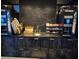 Elegant coffee bar area with modern coffee machines, marble backsplash, and well-stocked supplies for residents at 4471 Dean Martin Dr # 1207, Las Vegas, NV 89103