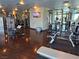 Fully-equipped gym area offering an assortment of weight machines, mirrors, and hardwood floors for a complete workout at 4471 Dean Martin Dr # 1207, Las Vegas, NV 89103