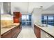 Modern kitchen features stainless steel appliances, granite countertops, and a city view at 4471 Dean Martin Dr # 1207, Las Vegas, NV 89103