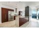 Modern kitchen with granite countertops, stainless steel appliances, and sleek cabinetry at 4471 Dean Martin Dr # 1207, Las Vegas, NV 89103