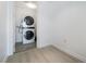 Bright laundry area features a stacked washer and dryer at 4471 Dean Martin Dr # 1207, Las Vegas, NV 89103