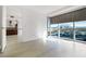 Bright living room with large windows and beautiful city views at 4471 Dean Martin Dr # 1207, Las Vegas, NV 89103