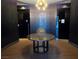 Elegant lobby area with decorative table and patterned wallpaper at 4471 Dean Martin Dr # 1207, Las Vegas, NV 89103