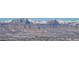 Vast mountain range overlooking a sprawling cityscape in the foreground at 4471 Dean Martin Dr # 1207, Las Vegas, NV 89103