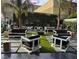 Stylish outdoor seating area with modern furniture and lush greenery at 4471 Dean Martin Dr # 1207, Las Vegas, NV 89103