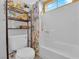 Bathroom featuring a shower-tub combo, modern fixtures, and natural light at 4655 Fire Fly Cir, Las Vegas, NV 89122