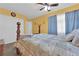 Bedroom with carpet, updated furniture and natural light at 4655 Fire Fly Cir, Las Vegas, NV 89122
