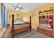 Inviting bedroom featuring natural light, carpet, and a ceiling fan at 4655 Fire Fly Cir, Las Vegas, NV 89122