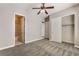 Bedroom includes closet and bathroom access with updated neutral paint and carpet at 5027 Crown Cypress St, Las Vegas, NV 89149