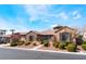 Inviting single-story home with lush landscaping, private driveway, and a desert-friendly yard at 5027 Crown Cypress St, Las Vegas, NV 89149
