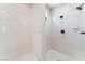 Clean and well-maintained tile shower with updated showerhead and fixtures at 5027 Crown Cypress St, Las Vegas, NV 89149