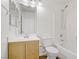 Bright bathroom featuring a shower-tub combination and a vanity with ample storage at 5948 Sakhalin Ave, Las Vegas, NV 89139