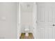 Clean half bathroom with a modern toilet, neutral walls, and simple finishes at 5948 Sakhalin Ave, Las Vegas, NV 89139