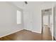 Bright bedroom features a window, ceiling fan, and closet for optimal comfort at 5948 Sakhalin Ave, Las Vegas, NV 89139