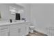 Bathroom featuring modern fixtures, a white vanity, and plenty of counter space at 600 N Carriage Hill Dr # 1164, Las Vegas, NV 89138