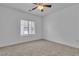Bright bedroom featuring a ceiling fan and sunlit windows at 600 N Carriage Hill Dr # 1164, Las Vegas, NV 89138