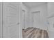 Well-lit hallway with clean lines offers a seamless flow between rooms at 600 N Carriage Hill Dr # 1164, Las Vegas, NV 89138