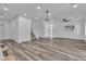 Spacious living room with hard surface floors, modern lighting, and ample natural light at 600 N Carriage Hill Dr # 1164, Las Vegas, NV 89138